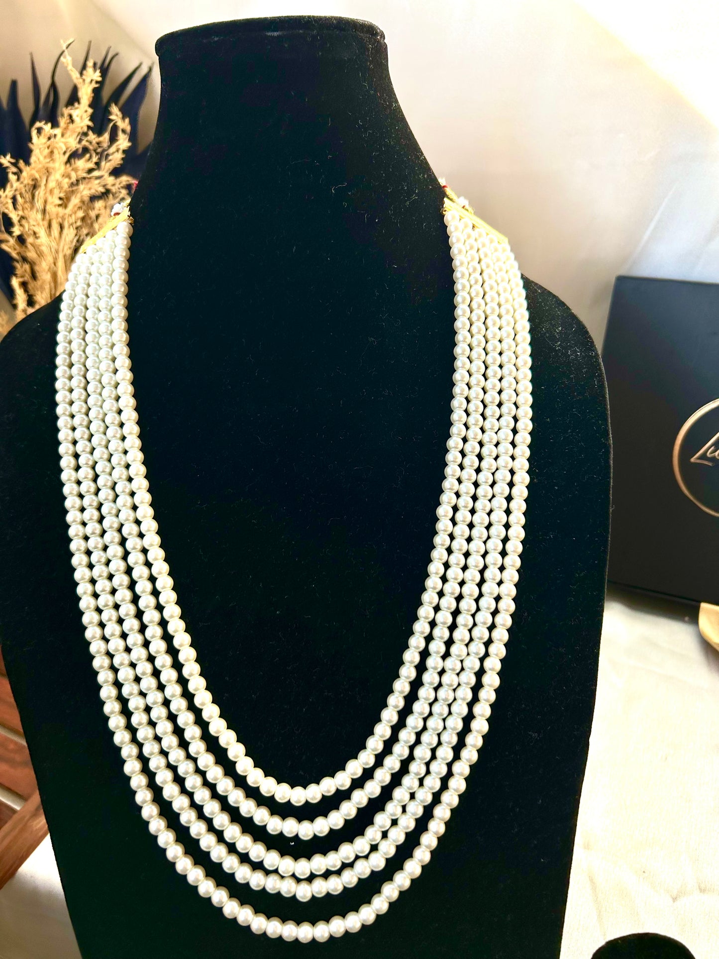 Neeta pearl long necklace.