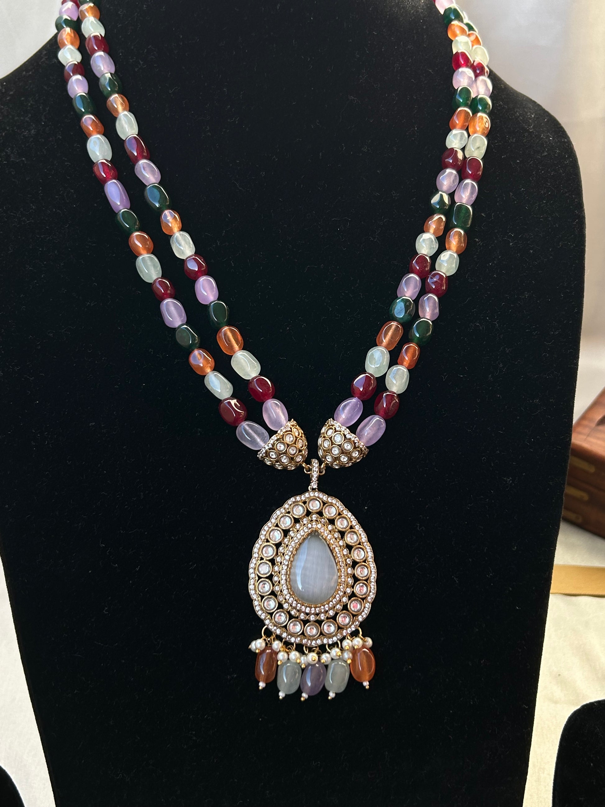 "Parineeti Multicolor Kundan Rani Haar – A gold-plated bridal necklace set with vibrant multicolored gemstones and matching earrings