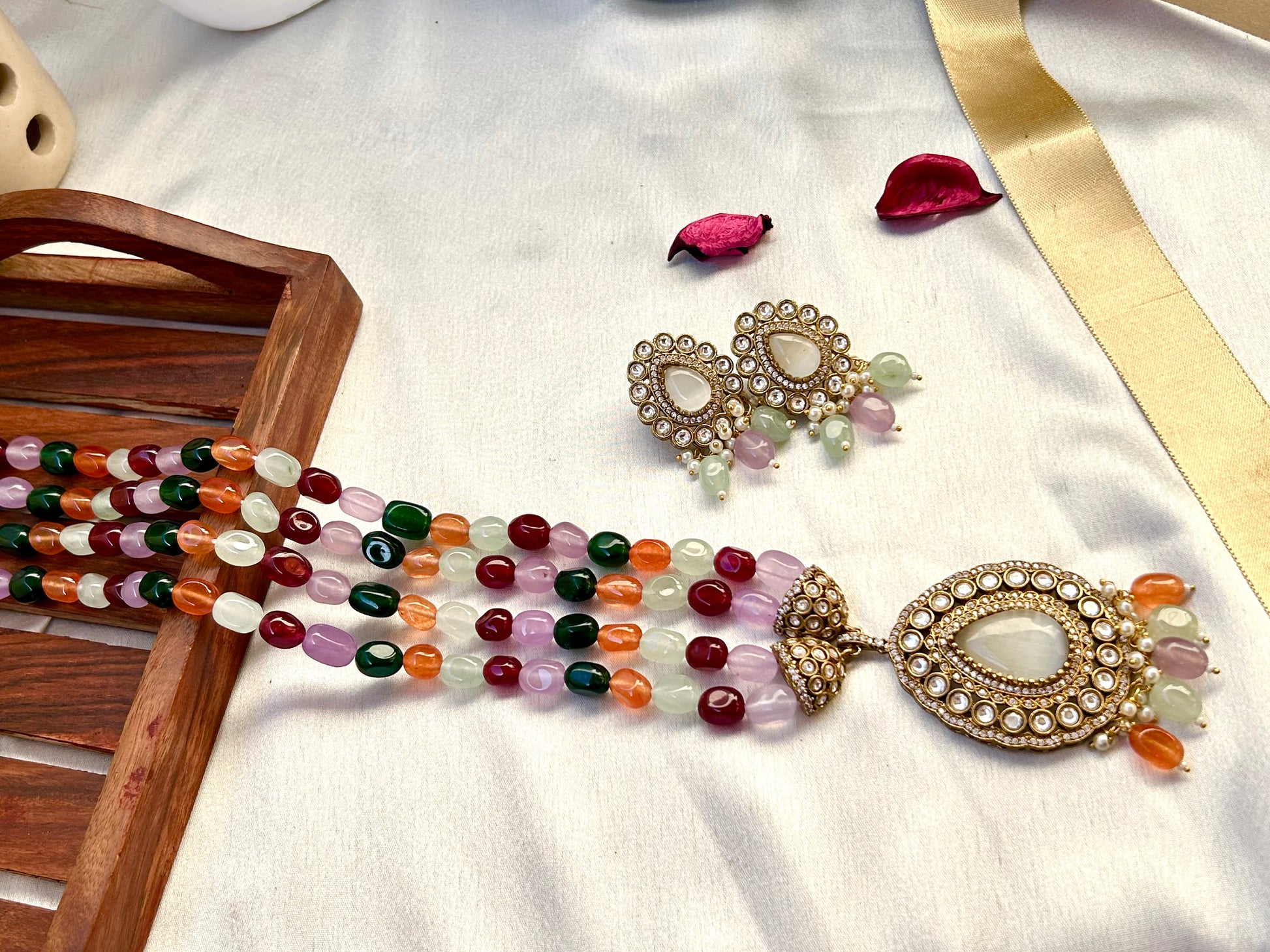 "Parineeti Multicolor Kundan Rani Haar – A gold-plated bridal necklace set with vibrant multicolored gemstones and matching earrings