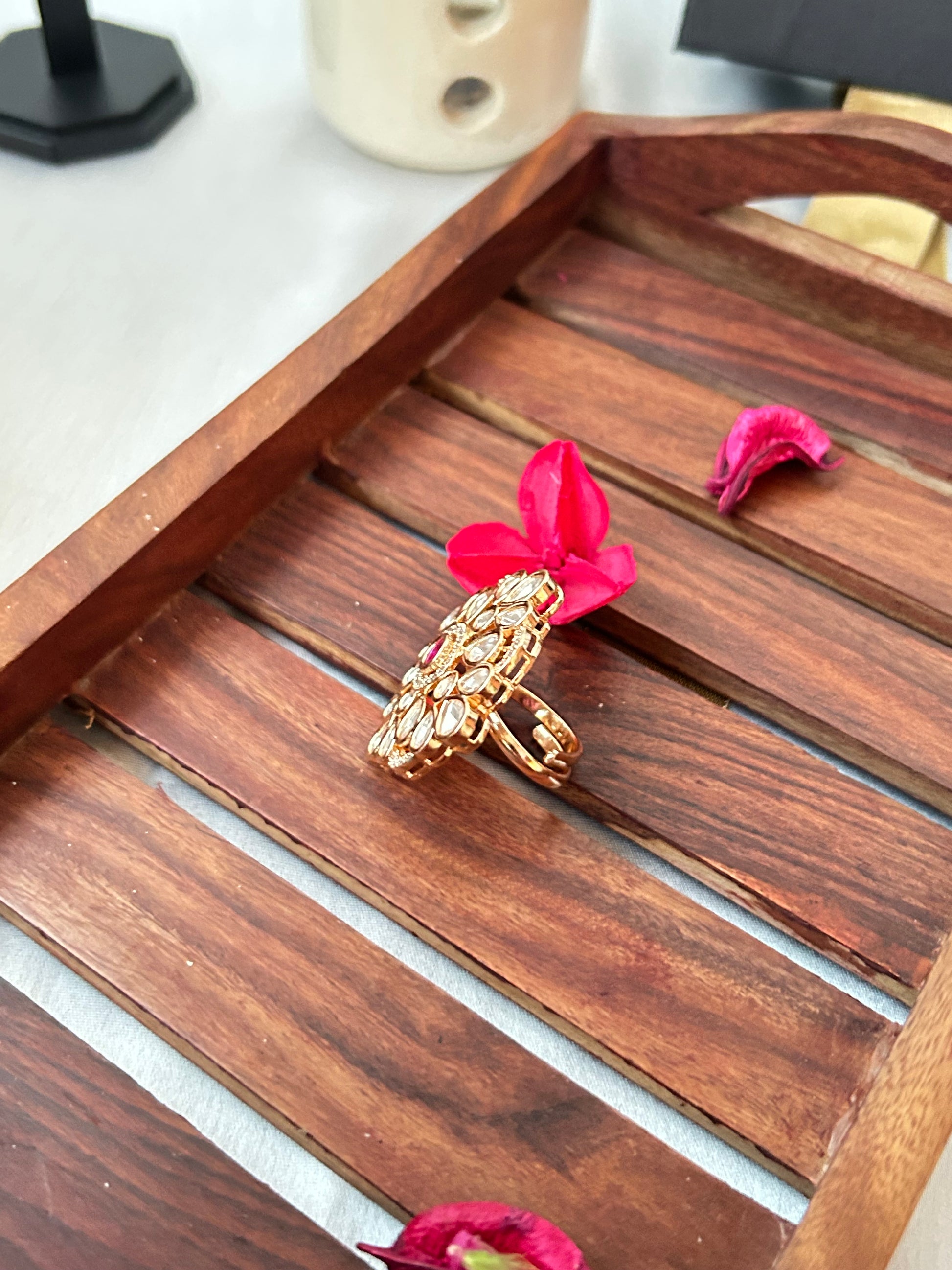 Ruby red and Kundan ring with gold-plated floral design