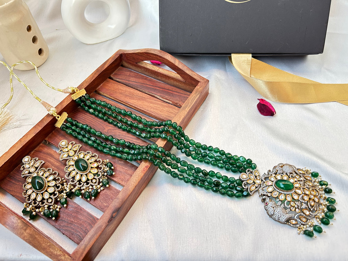 Simar Emerald Kundan Necklace Set with lush green beads, uncut Kundan stones, and matching earrings, perfect for bridal and festive wear.emerald green rani haar long necklace