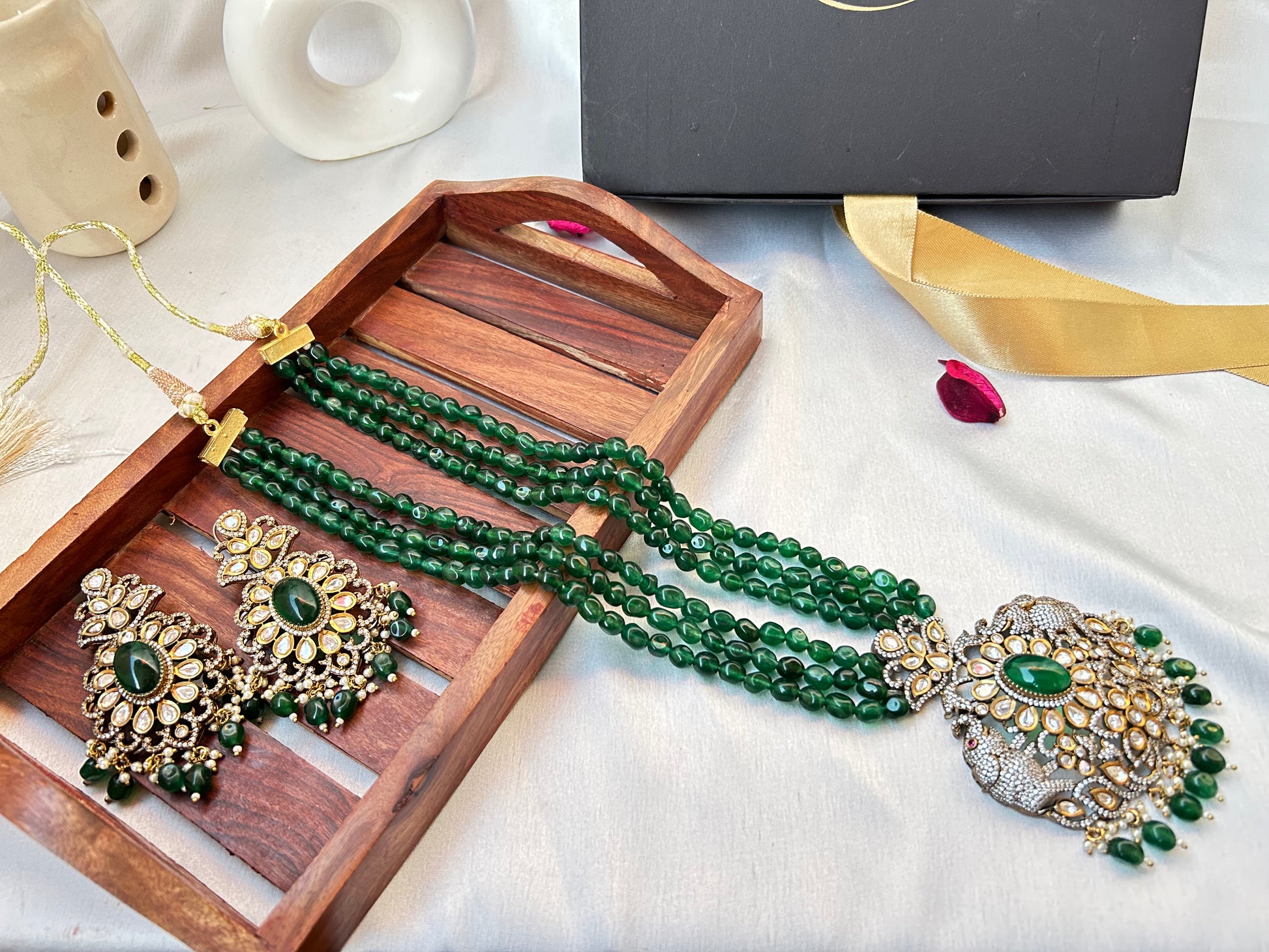 Simar Emerald Kundan Necklace Set with lush green beads, uncut Kundan stones, and matching earrings, perfect for bridal and festive wear.emerald green rani haar long necklace