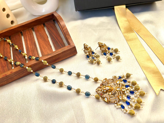Keshavi Kundan necklace set with navy blue beads and pearls, perfect for weddings and festive wear."