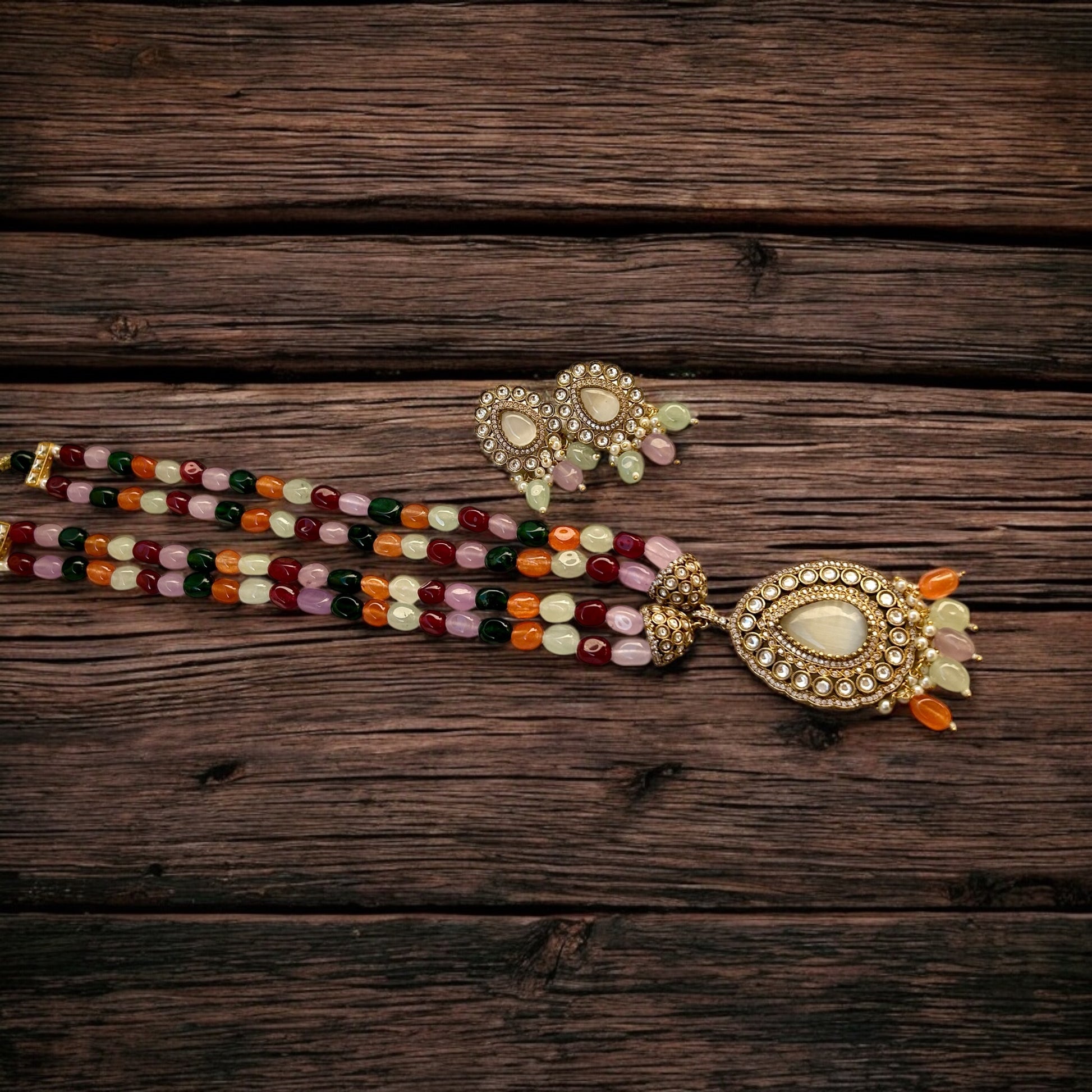 "Parineeti Multicolor Kundan Rani Haar – A gold-plated bridal necklace set with vibrant multicolored gemstones and matching earrings