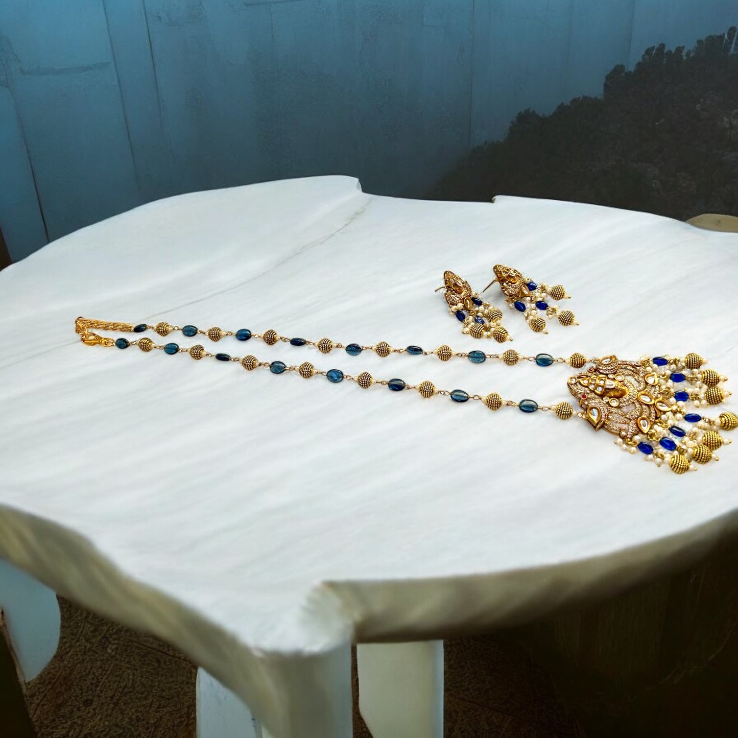 Keshavi Kundan necklace set with navy blue beads and pearls, perfect for weddings and festive wear."
