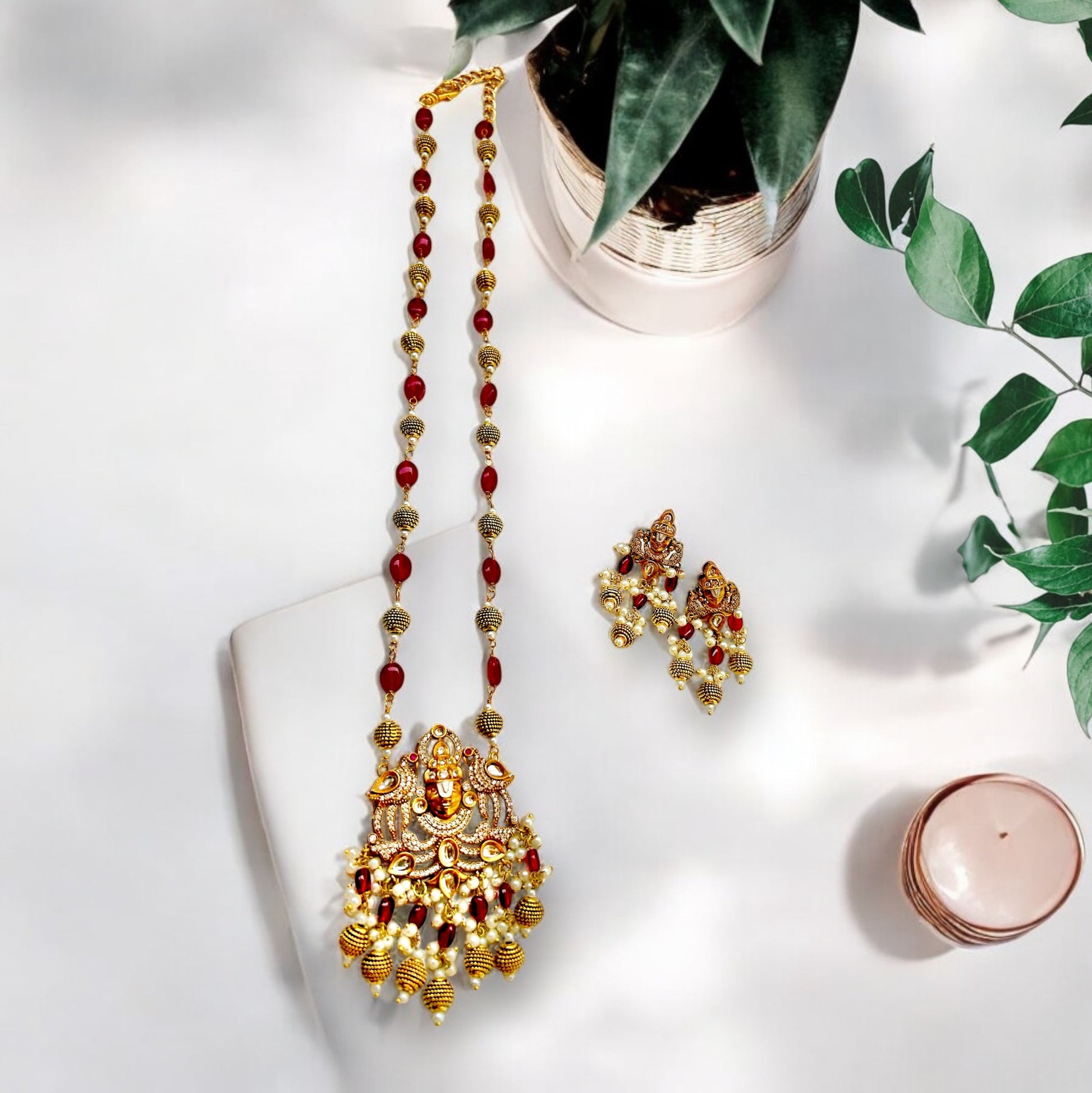 Keshavi Kundan necklace set with red beads and pearls, perfect for weddings and festive wear."