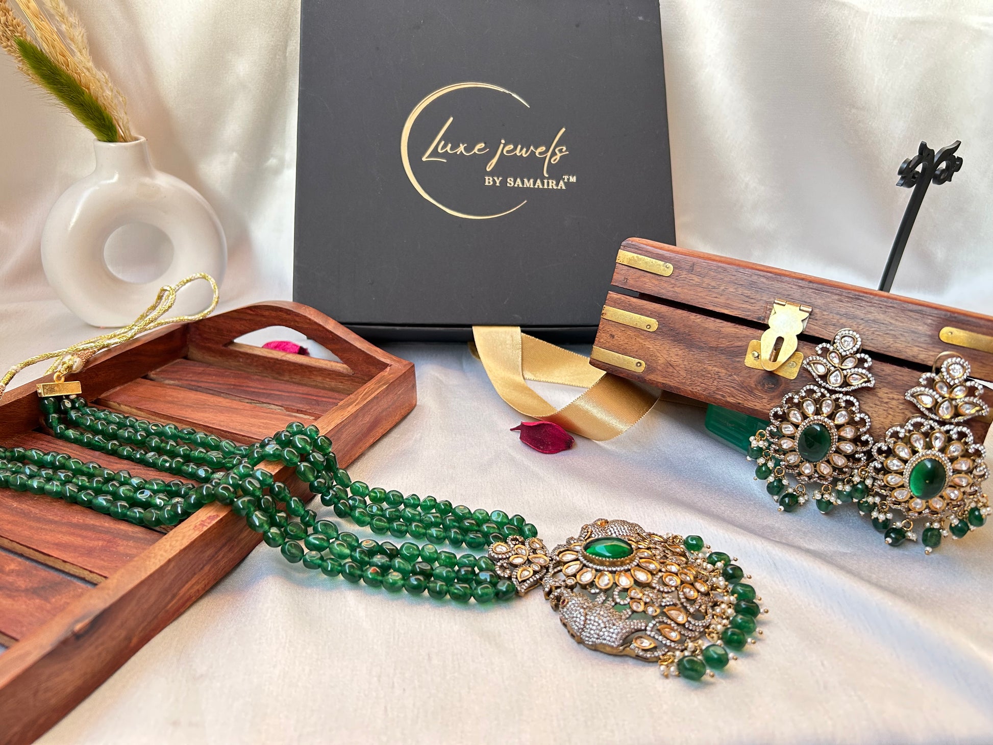Simar Emerald Kundan Necklace Set with lush green beads, uncut Kundan stones, and matching earrings, perfect for bridal and festive wear.emerald green rani haar long necklace
