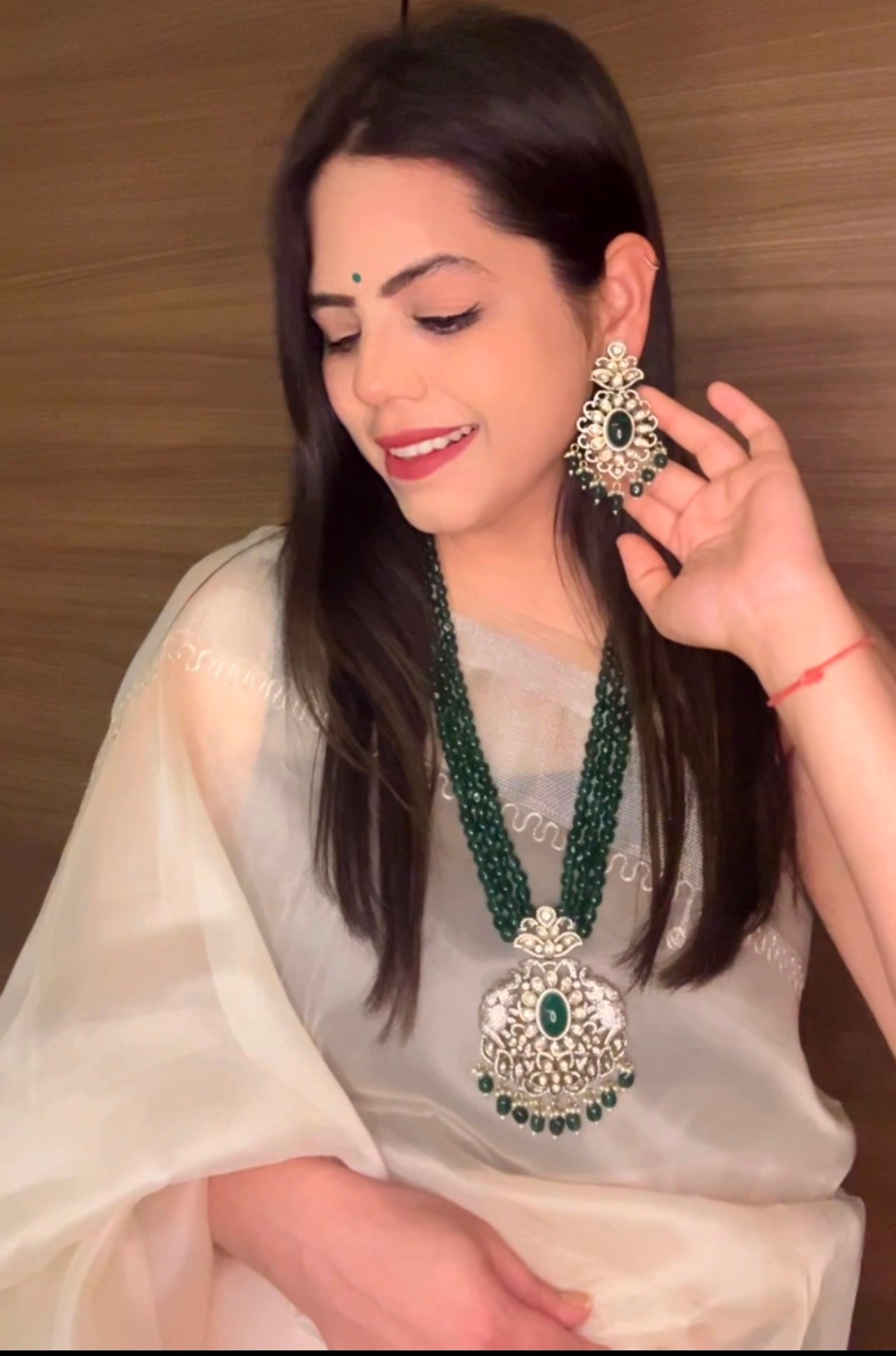 Simar Emerald Kundan Necklace Set with lush green beads, uncut Kundan stones, and matching earrings, perfect for bridal and festive wear.emerald green rani haar long necklace