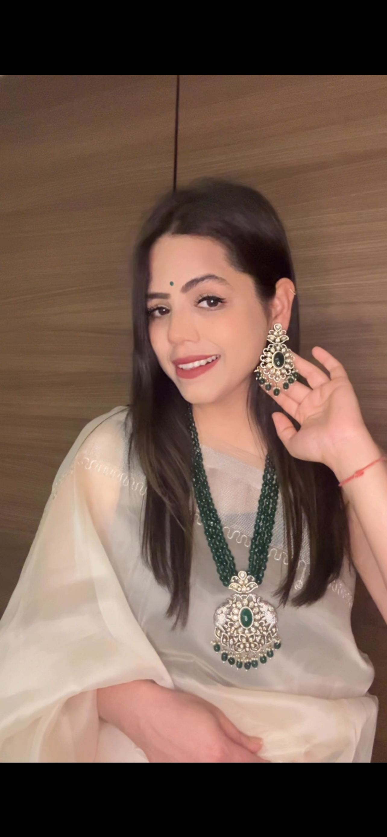 Simar Emerald Kundan Necklace Set with lush green beads, uncut Kundan stones, and matching earrings, perfect for bridal and festive wear.