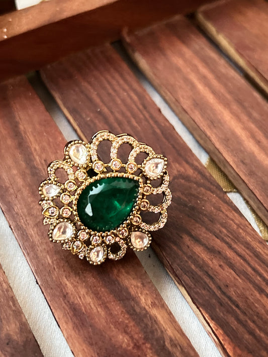 Floral emerald green ring with American diamonds and gold finish