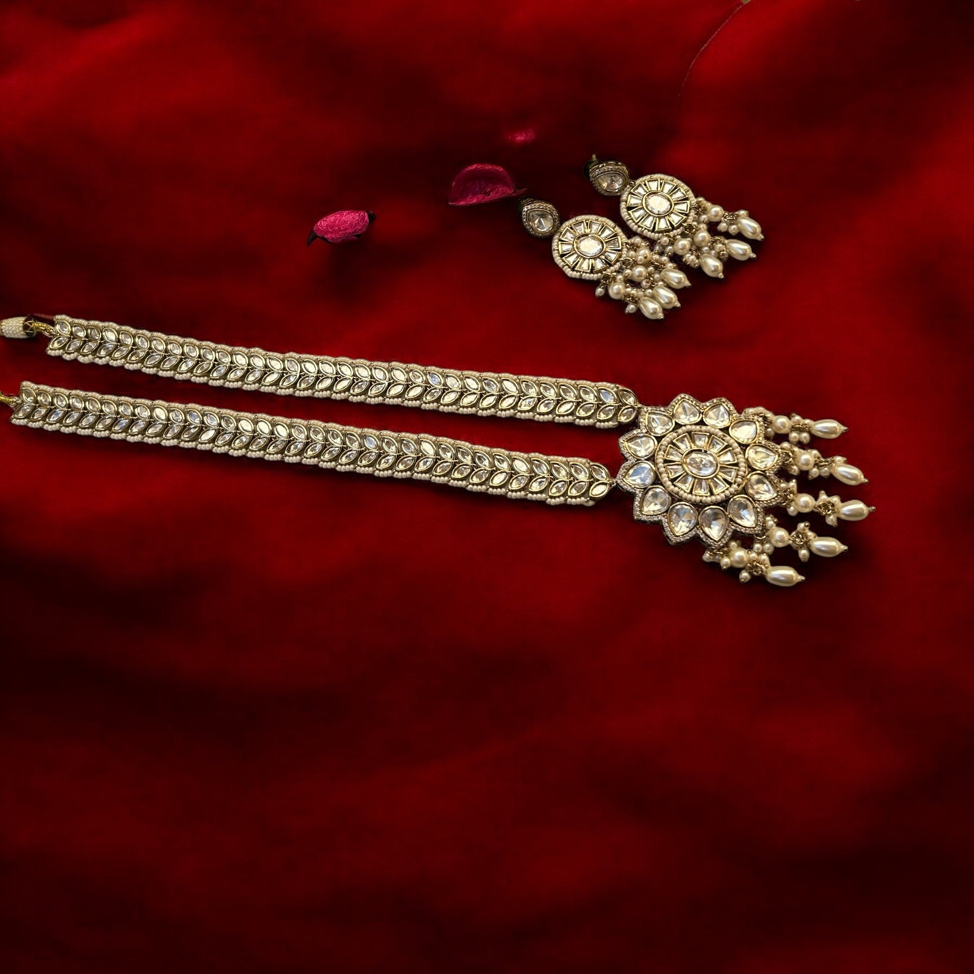 A luxurious Polki Rani Haar set with a statement pendant and matching earrings, perfect for bridal and festive wear.