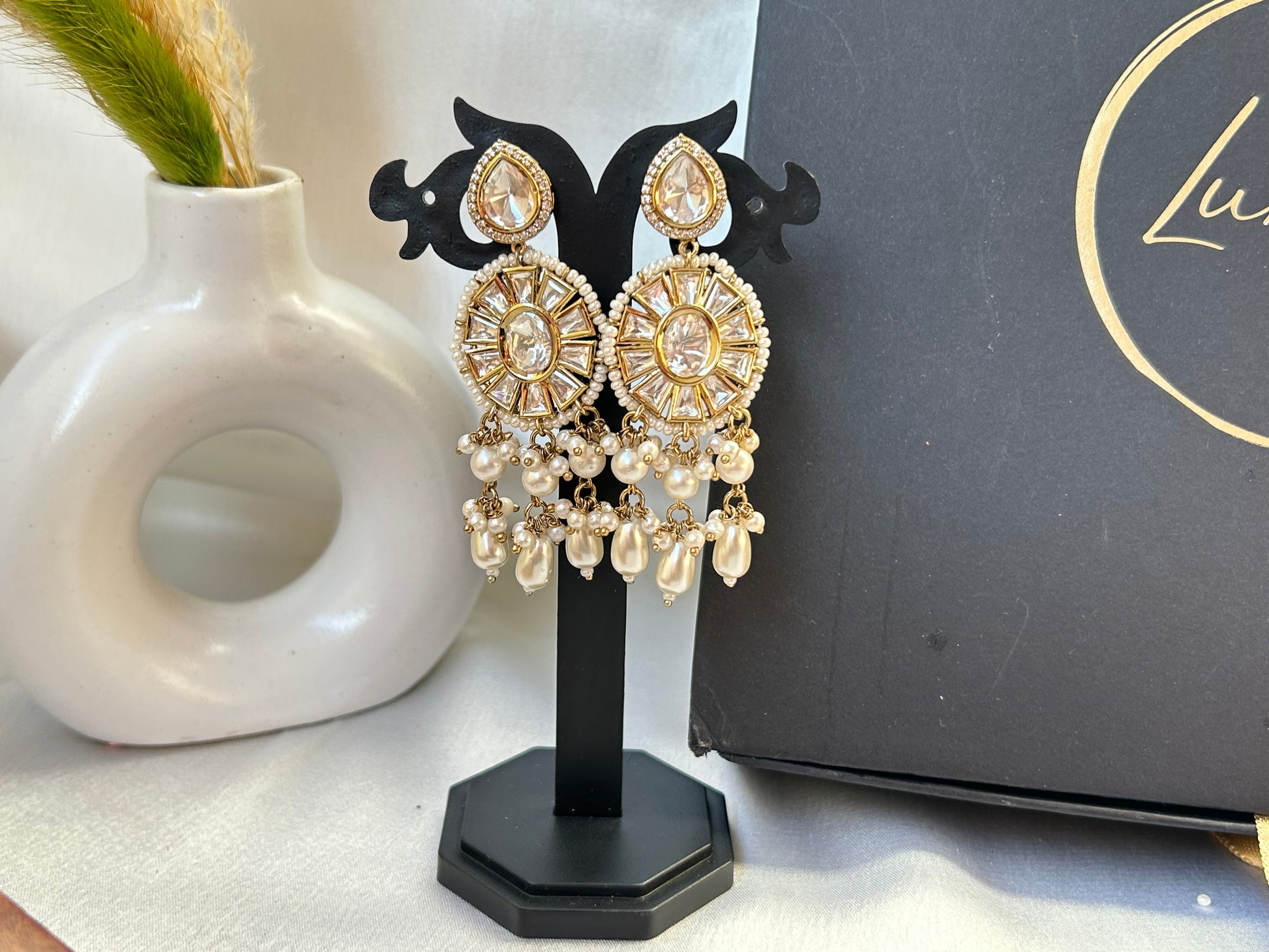 A luxurious Polki Rani Haar set with a statement pendant and matching earrings, perfect for bridal and festive wear.