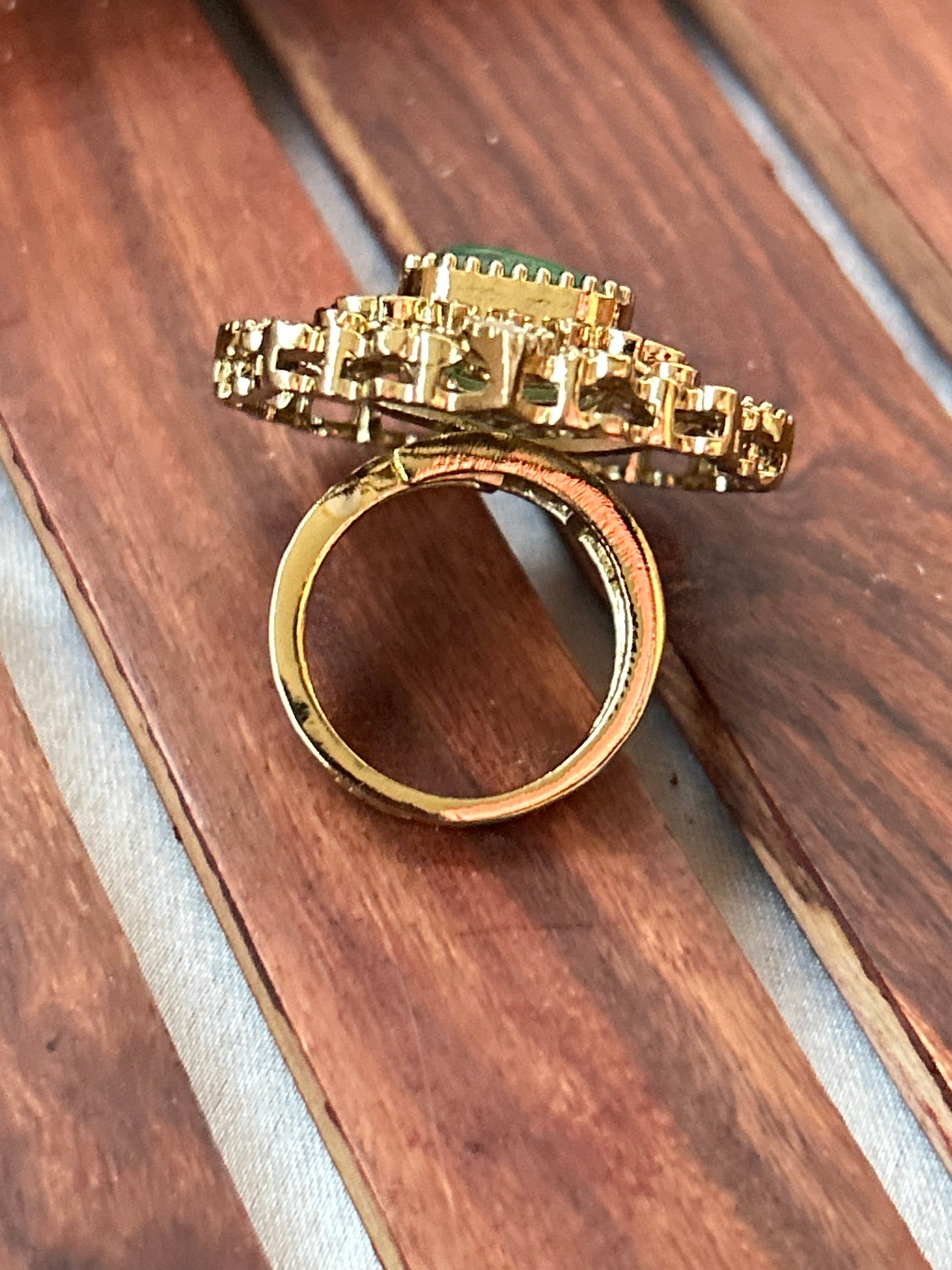  dark sea green statement ring with American diamonds and gold-plated finish,kundan ring