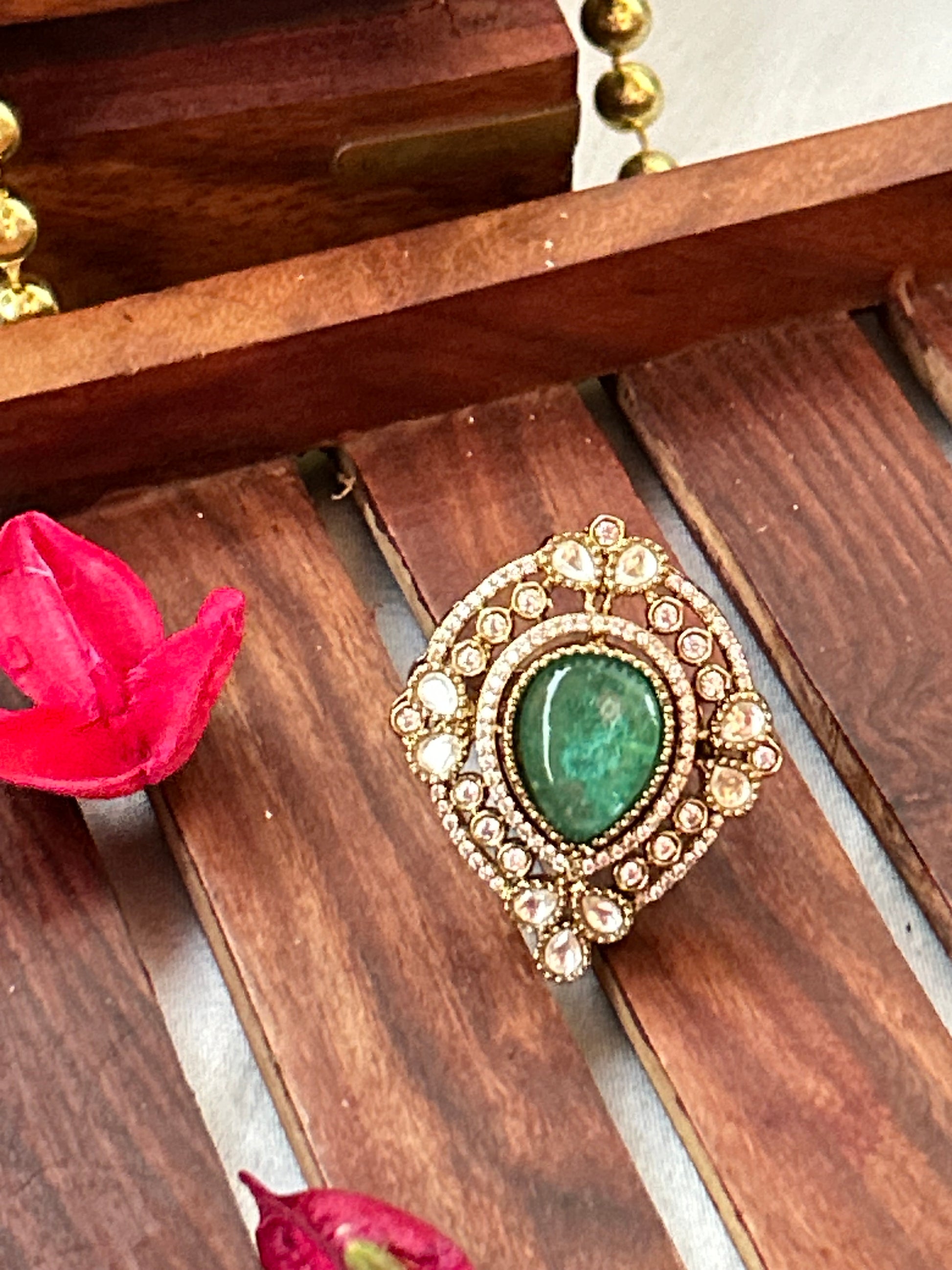  dark sea green statement ring with American diamonds and gold-plated finish,kundan ring