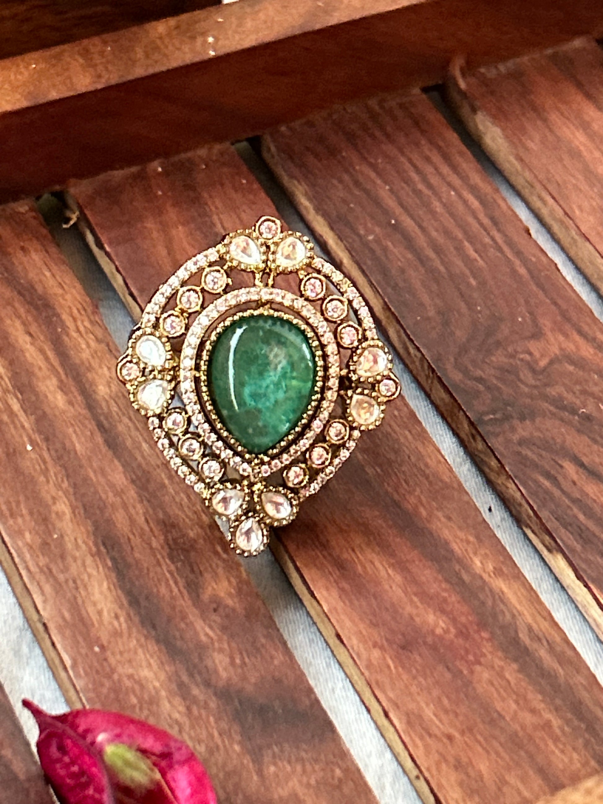  dark sea green statement ring with American diamonds and gold-plated finish,kundan ring