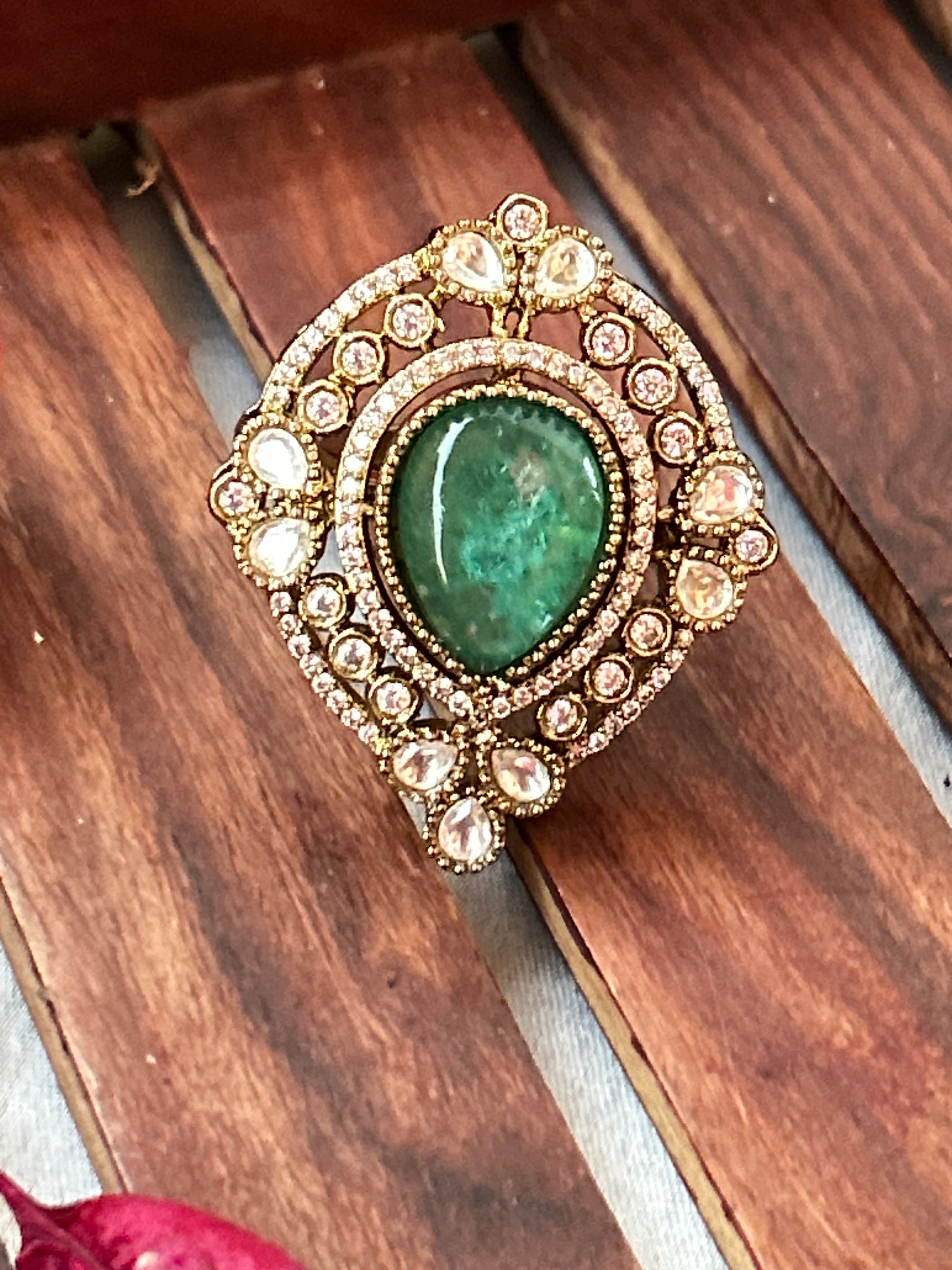  dark sea green statement ring with American diamonds and gold-plated finish,kundan ring